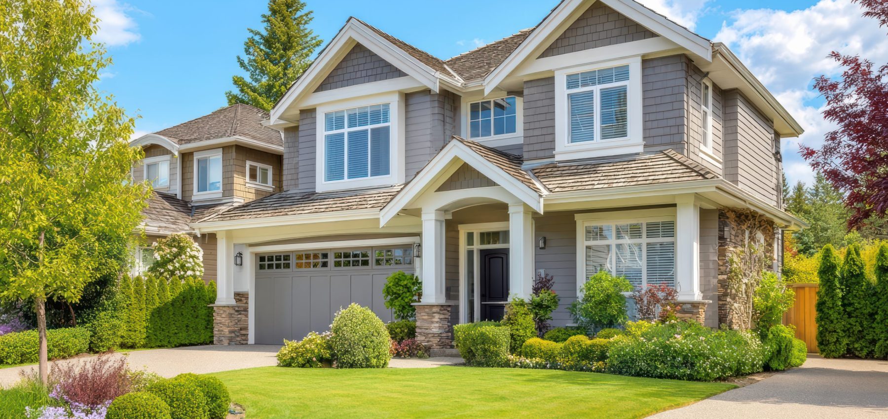 beautiful-modern-suburban-home-with-manicured-lawn-landscaping (1)